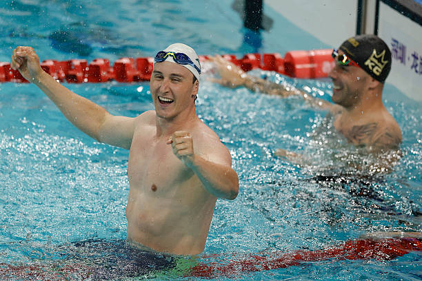 Cameron McEvoy of Australia celebrates after winning the gold medal in the Men's 50m Freestyle Final during day two of the China Open Swimming...
