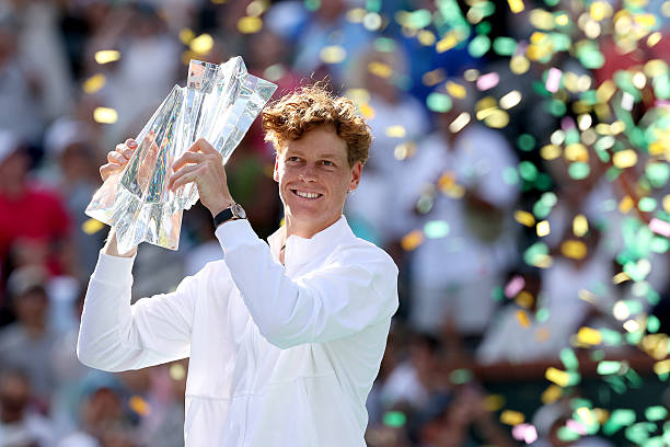Jannik Sinner of Italy poses with the trophy after defeating Daniil Medvedev during the Men's Singles Finals on Day 12 of the BNP Paribas Open at...