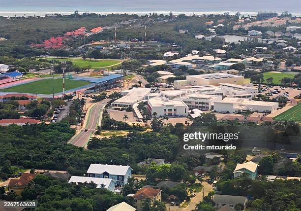 aerial view of the john gray high school campus and surrounding area, grand cayman, cayman islands - cayman islands stock pictures, royalty-free photos & images