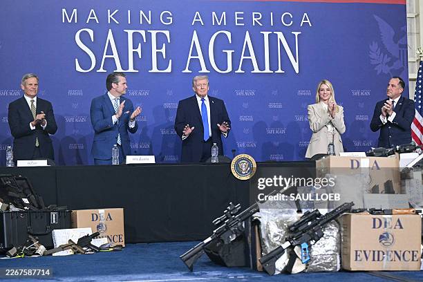 Tennessee Governor Bill Lee, US Secretary of Defense Pete Hegseth, US President Donald Trump, Attorney General Pam Bondi, and Director of the US...