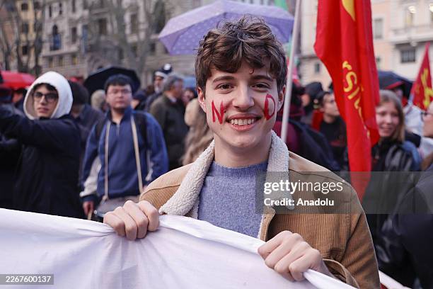 People celebrate the victory of for the NO in the constitutional referendum during a demonstration in Rome, Italy, on March 23, 2026. Around 54% of...