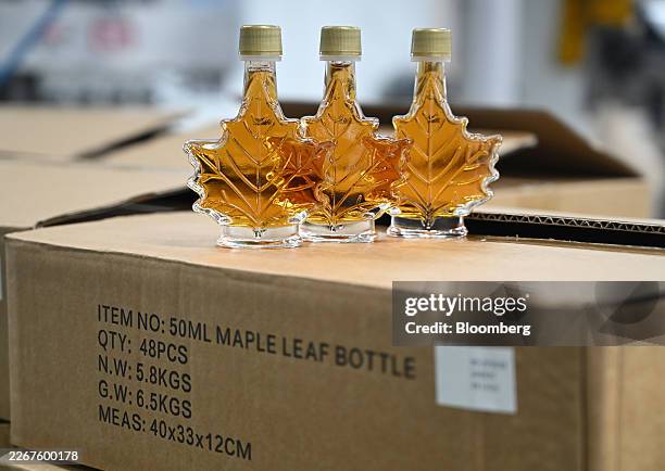 Bottles of maple syrup at a Turkey Hill bottling facility in Granby, Quebec, Canada, on Monday, March 23, 2026. The company provides maple products...