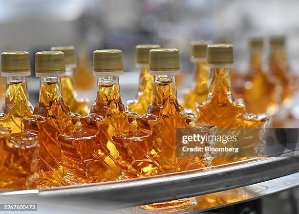 Bottles of maple syrup at a Turkey Hill bottling facility in Granby, Quebec, Canada, on Monday, March 23, 2026. The company provides maple products...