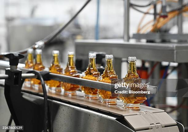 Bottles of maple syrup at a Turkey Hill bottling facility in Granby, Quebec, Canada, on Monday, March 23, 2026. The company provides maple products...