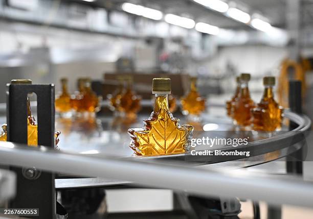 Bottles of maple syrup at a Turkey Hill bottling facility in Granby, Quebec, Canada, on Monday, March 23, 2026. The company provides maple products...