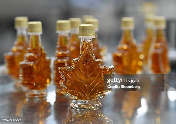 Bottles of maple syrup at a Turkey Hill bottling facility in Granby, Quebec, Canada, on Monday, March 23, 2026. The company provides maple products...