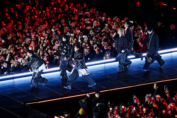 Pop boy band BTS perform onstage during comeback concert at Gwanghwamun Square on March 21, 2026 in Seoul, South Korea. The free concert is the...