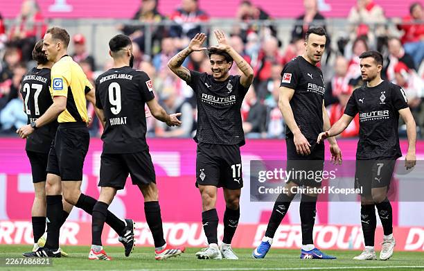 Jens Castrop of Borussia Monchengladbach celebrates scoring his team's first goal with teammates during the Bundesliga match between 1. FC Köln and...