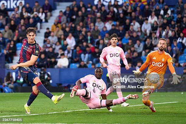 Carlos Espi of Levante UD scores his team's second goal during the LaLiga EA Sports match between Levante UD and Real Oviedo at Ciutat de Valencia on...