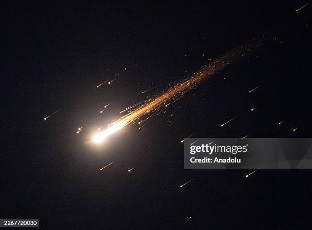 Missiles launched by Iran in retaliation for US and Israeli attacks are seen over the skies of Jerusalem, on March 24, 2026.