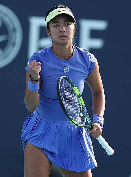 Alexandra Eala of the Philippines celebrates a point against Magda Linette of Poland during Day 5 of the Miami Open at Hard Rock Stadium on March 21,...