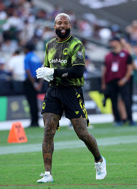 Odell Beckham Jr. #13 của đội Wildcats FFC thể hiện cảm xúc trong giải Fanatics Flag Football Classic 2026 tại sân vận động BMO ở Los Angeles vào ngày 21 tháng 3 năm 2026,...