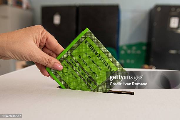 Ballot paper is inserted into the ballot box during the voting process for the 2026 Constitutional Referendum on justice reform on March 22, 2026 in...