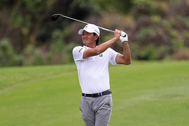 Taichi Kho of Hong Kong plays his approach on hole 2 on day four of the Hainan Classic presented by MAEXTRO 2026 at Mission Hills Haikou on March 22,...