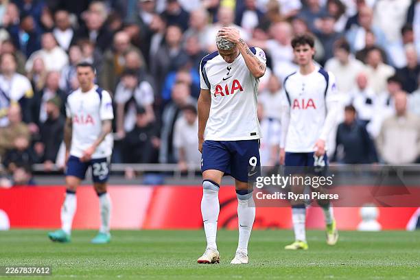 Richarlison of Tottenham Hotspur looks dejected after conceding a second goal scored by Morgan Gibbs-White of Nottingham Forest during the Premier...