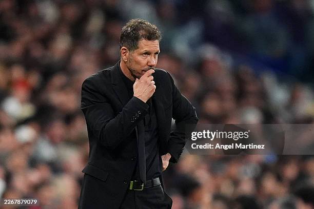 Diego Simeone, Head Coach of Atletico de Madrid, reacts during the LaLiga EA Sports match between Real Madrid CF and Atletico de Madrid at Estadio...