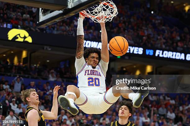 Isaiah Brown of the Florida Gators dunks the ball against the Iowa Hawkeyes during the second half in the second round of the 2026 NCAA Men's...