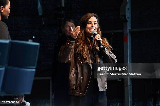 Actress and TV host Collien Fernandes speaks as people gather to protest against online aussaults against women on March 26, 2026 in Hamburg,...