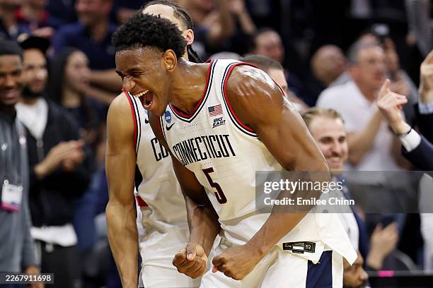Tarris Reed Jr. #5 of the UConn Huskies celebrate safter defeating the UCLA Bruins 73-57 in the second round of the 2026 NCAA Men's Basketball...