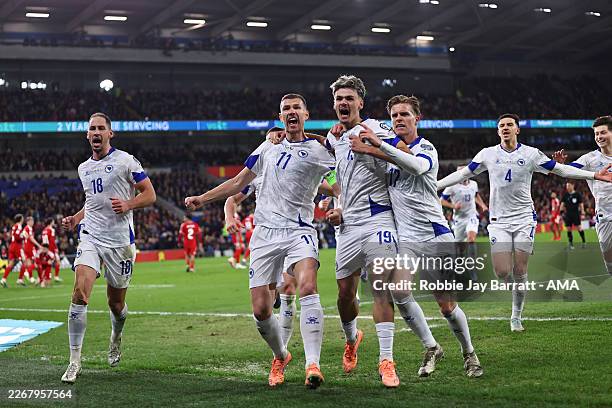Edin Dzeko of Bosnia and Herzegovina celebrates after scoring a goal to make it 1-1 during the FIFA World Cup 2026 European Qualifiers KO play-off...