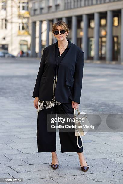Victoria Scheu wears culotte black pants Cos, polo shirt Cos, blazer to lace Zara, kitten heels Bobbies, fringed beige asymmetric scarf Arket Hermes...