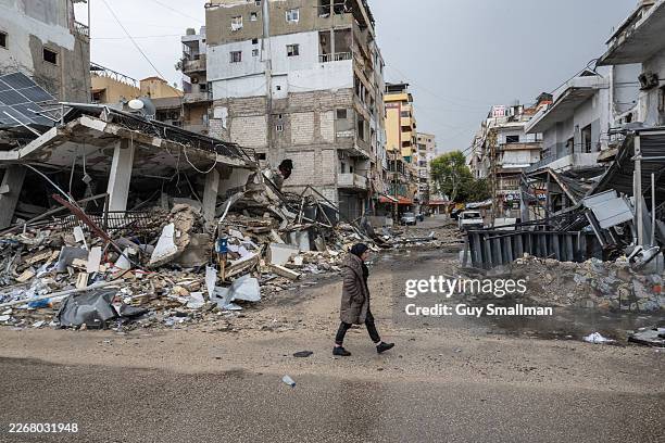 Residential and commercial buildings damaged by Israeli Air strikes that were targeting the Hezbollah affiliated al-Qard al-Hassan financial...