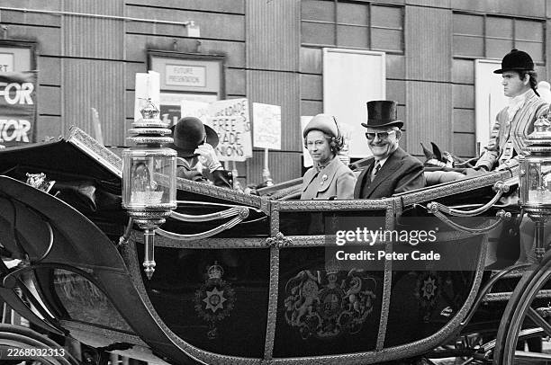 President of Brazil Ernesto Geisel smiles while riding in a royal carriage with Queen Elizabeth II during his state visit to London, May 4th 1976.