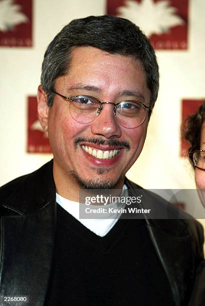 Producer Dean Devlin arrives at the grand opening of the club/restaurant White Lotus on March 7, 2003 in Hollywood, California.