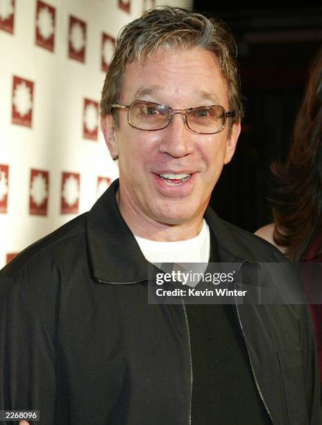 Actor Tim Allen arrives at the grand opening of the club/restaurant White Lotus on March 7, 2003 in Hollywood, California.