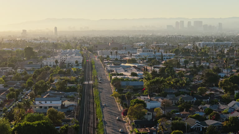 https://media.gettyimages.com/id/2268212280/video/establishing-aerial-shot-of-exposition-blvd-in-jefferson-park-in-los-angeles-california.jpg?b=1&s=640x640&k=20&c=SyIcN_wBCk4w0de-TZvq1fQAoGFoF-vk53HRcuEOScQ=