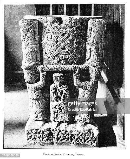 stoke cannon font located in devon - st mary the virgin church stock illustrations