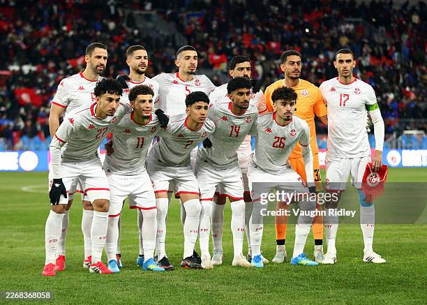 Tunisia players stand for a team group photo before an International Friendly against Haiti at BMO Field on March 28, 2026 in Toronto, Ontario,...