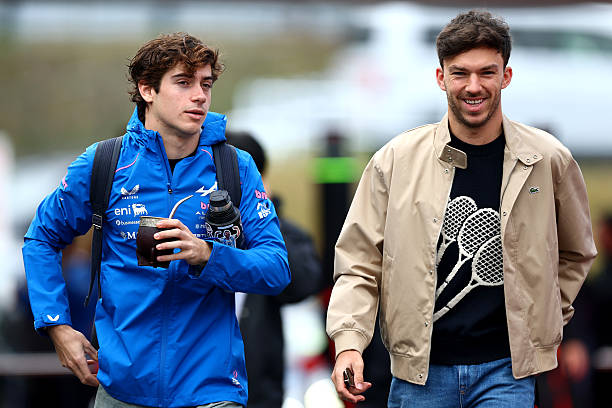 Franco Colapinto of Argentina and Alpine F1 and Pierre Gasly of France and Alpine F1 arrive in the Paddock during previews ahead of the F1 Grand Prix...