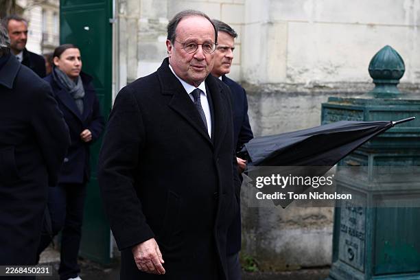Former President of France Francois Hollande arrives ahead of the funeral of former Prime Minister Lionel Jospin at the Montparnasse cemetery on...
