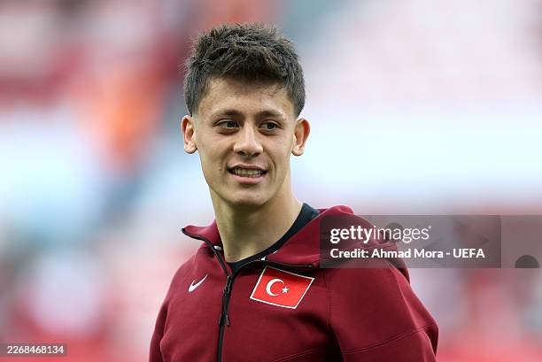 Arda Gueler of Turkiye inspects the pitch prior to the FIFA World Cup 2026 European Qualifiers KO play-offs match between Türki̇ye and Romania at...