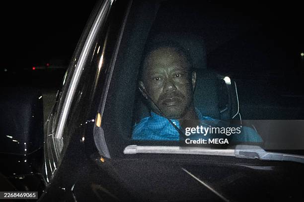Tiger Woods is seen leaving Martin County Jail after being arrested for driving under the influence after a car crash on March 27, 2026 in Stuart,...