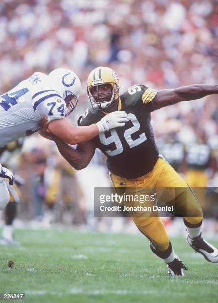 GREEN BAY REGGIE WHITE DRIVES AROUND THE OUTSIDE OF INDIANAPOLIS OFFENSIVE TACKLE JASON MATHEWS DURING THE PACKERS 20-17 LOSS TO THE COLTS AT LAMBEAU...