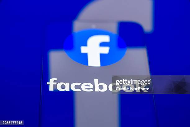 The Facebook logo is displayed on a smartphone screen in this photo illustration in Brussels, Belgium, on March 29, 2026. Meta Platforms expands its...