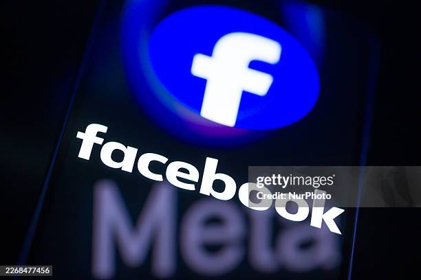 The Facebook logo is displayed on a smartphone screen in this photo illustration in Brussels, Belgium, on March 29, 2026. Meta Platforms expands its...