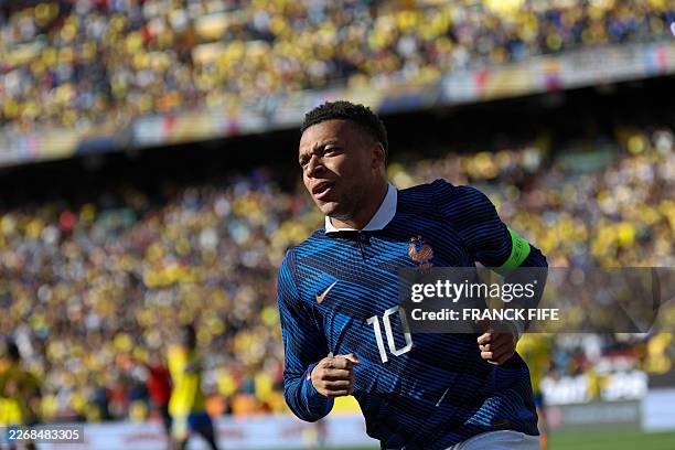 France's forward Kylian Mbappe reacts after his attempt to score a goal that was not allowed for being offside, during a friendly football match...