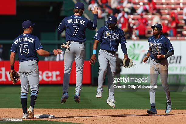 Carson Williams and Jonny DeLuca both of the Tampa Bay Rays celebrate after beating the St. Louis Cardinals at Busch Stadium on March 29, 2026 in St...
