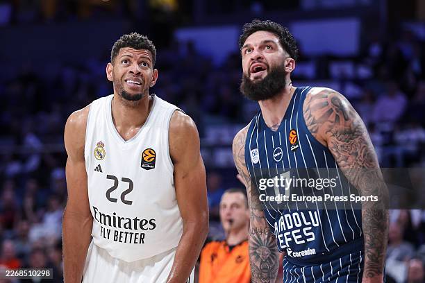 Walter Tavares of Real Madrid and Vincent Poirier of Anadolu Efes Istanbul gesture during the Turkish Airlines EuroLeague Regular Season Round 34...