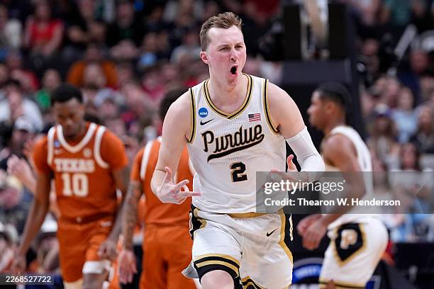 Fletcher Loyer of the Purdue Boilermakers reacts against the Texas Longhorns during the first half in the Sweet Sixteen of the 2026 NCAA Men's...