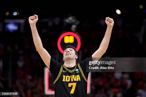 Alvaro Folgueiras of the Iowa Hawkeyes celebrates after defeating the Nebraska Cornhuskers in the Sweet Sixteen of the 2026 NCAA Men's Basketball...