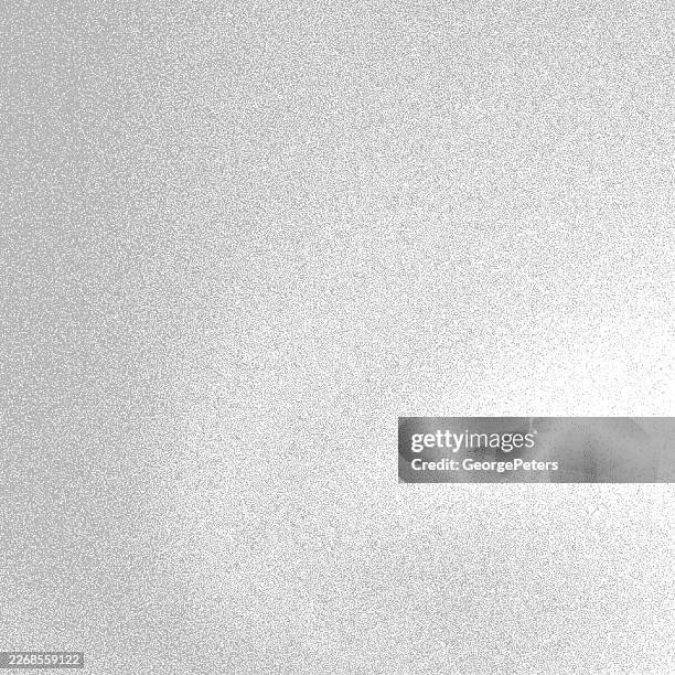 soft, spot lit grainy background - silver texture background stock illustrations