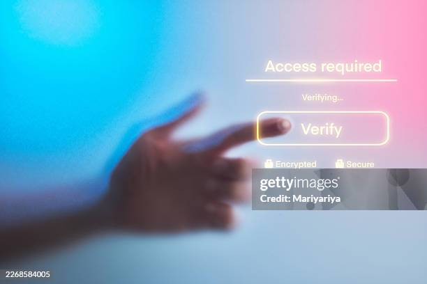 hand touching verify button on digital security interface - name patch stock pictures, royalty-free photos & images