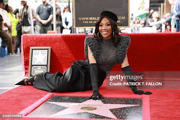 Singer and actress Brandy poses with her newly unveiled Walk of Fame star in Hollywood on March 30, 2026.