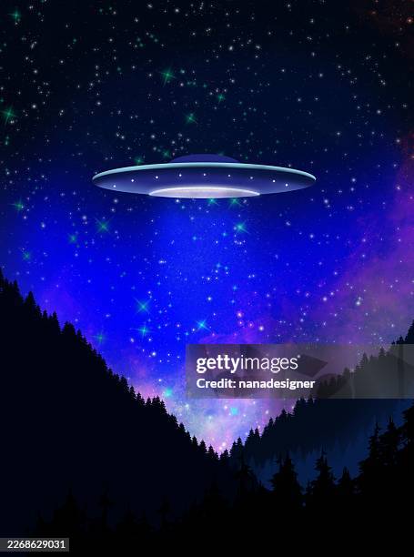 ufo hovering over mountain forest under starry night sky - alien abduction stock illustrations