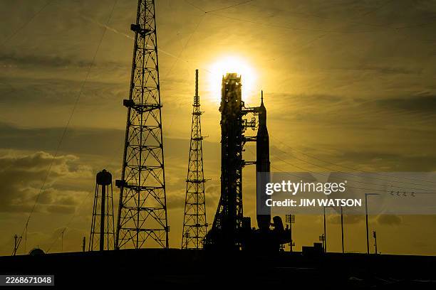 S Artemis II Space Launch System rocket and Orion spacecraft rest on Launch Pad 39B at Kennedy Space Center in Cape Canaveral, Florida, on March 31...