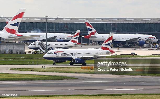 British Airways Airbus A319 taxis near to Heathrow Airport's Terminal 5 on March 31, 2026 in London, England. London Heathrow is one of the world's...